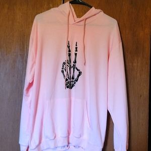 Shein Mens Large pink hoodie with black skeleton peace sign.